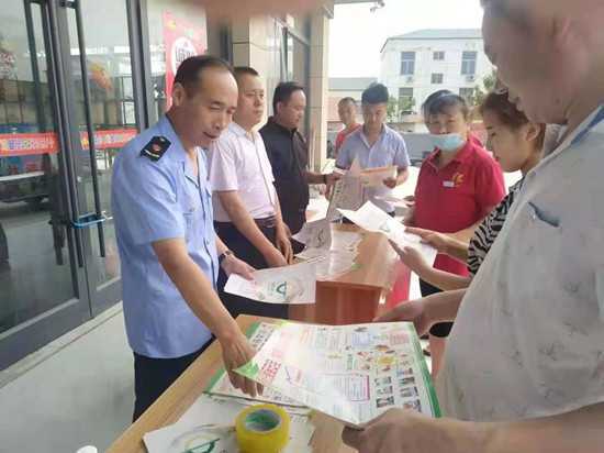 平邑县铜石镇举办“食品安全宣传周活动”(图1)